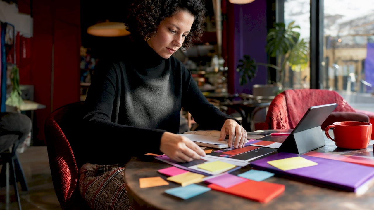 Content strategist arranging multichannel materials